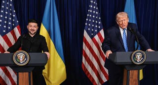 Ukrainian president Volodymyr Zelensky smiles after US president Donald Trump said that Russian president Vladimir Putin expressed willingness to help Ukraine 'succeed', during a press conference at Trump's Mar-a-Lago club, in Palm Beach